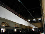 Inside of St. Francis.  The white drape is a manually operated fan.  It was easy to imagine attending services during the colonial era with the sounds of exotic birds outside and the rustle of palm trees.  The memorials to British businessmen by their companies poignantly show that the British did not expect to leave.