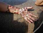 Henna "tattoos" - one of the things for sale around the arch.  Applied with stamps.