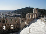 Herodes Atticus, a rich Roman, built a 5,000-seat odeum as a memorial to his wife in AD 161. A conventional Roman theatre except that the semicircular auditorium was hollowed out of the rock, it was roofed in cedar and had a three-story facade of arches. Repaired but roofless, it is now used for the Athens summer festival. 