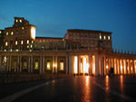 In the upper right side, there are three lighted windows.  These are the Pope's apartments.  The rightmost is his bedroom.