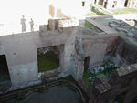 Looking down into the part of the palace that was built off the western edge of the hill.  The oddly shaped pieces at the top right are the remains of a fountain in the lower courtyard