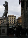 David in front of the Palazzo Vecchio and looking across the Piazza