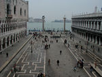 The piazzetta looking toward the Basin with the Doge's palace on the left, the library on the right, and two saints on pillars.