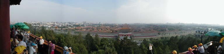 This gives some idea of how big the Forbidden City is.  The wall in the foreground is the shortest side of the rectangular enclosure.  This is taken from Jinghshan Gongyan, the park on the north side of the City, and a very nice change from the bleak, crowded spaces of the City.  