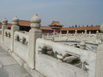 Beyond the Meridian Gate is a large courtyard (the place is arranged as a series of gates, courtyards, and raised pavilions as one walks north through it), through which the Golden River runs in a bow-shaped arc. The river is crossed by five parallel white marble bridges, which lead to the Gate of Supreme Harmony.