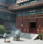 We often see Chinese people lighting incense and going through devotional motions.