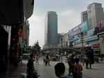 Downtown Chengdu.  There are old neighborhoods, too, but they seem to be in the process of getting knocked down and replaced with newer buildings.  Downtown Chengdu is a bit like downtown Denver or Cherry Creek.  There's lots of big buildings and nice shops but all with an unreal, "look at me!" air.  Chengdu is cleaner and has fewer cars.  