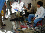 A prayer wheel repair shop.