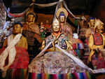 At Sera monastery, founded in 1419.   This is a statute (we think) of the Fifth Dalai lama.  Statues like these are the most obvious feature of the chapels in monasterys.  They may be of famous lamas, gods or goddesses, and now and then a very famous human.  Commonly called the Great Fifth. He established, with the military assistance of the Mongols, the supremacy of the Galugpa sect (the "Yellow Hats") over rival orders for the temporal rule of Tibet. He also built the Potala.