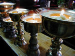 Butter lamps in the chapel.  These are traditionally filled with yak butter, but nowadays they are mainly filled with vegetable ghee.