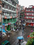 Thamel Chowk, an intersection in Thamel, the main tourist area in Kathmandu.  Though touristy, Thamel is a comfortable place to hang out.  There are western bakeries and bars, as well as hole in the wall Nepalese places.  