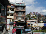 Looking at the signs in this photo will give you an idea of what Thamel is like
