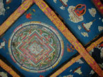 Inside a shrine in Jharkot, now that Maggie has made us look at the ceilings, we see these more often.