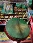 Drum with holy books in the background
