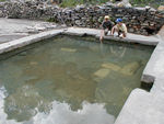 Hot spring pool.  Too hot to get into.  Tatopani means hot water