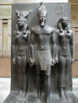 Triad of Menkaura.  Found in the valley temple associated with the "little" pyramid at Giza - the pyramid of King Menkaura.  The kind wears the crown of Upper Egypt and is flanked by Hathor - god of music, beauty, and love - and a woman who represents one of the districts of Egypt.