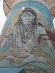 Shiva.  Crescent moon in his hair and snake around his neck.
