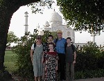 Merry Christmas from the Hughes Family.  This was taken by a gardener who was resting and interested in us.  Unlike all the photo touts swarming the Taj, he didn't want a tip.