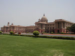 The Secretariat buildings at the end of the Rajpath, opposite India Gate.  They sit on Raisina Hill which had its top blasted off to make an acropolis for the President's house and the Secretariat buildings.  (Imagine the relation of the Capitol Building in DC to the Washington Monument, and you'll get a fair idea of how impressive the view down the Rajpath is.)
