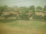 What the world looks like through the smoky windows of the train.  This is one reason we really liked travelling by bus