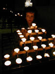 Maggie and the candles at Sacre Coeur
