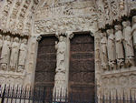 The central portal at Notre Dame - at the bottom, the dead are resurrected; just above them, it's judgment time.  The guys on the right are being led off in chains by some devils