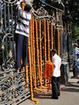 Marigold blossoms decorating the gates of Horniman Circle for a benefit.  This is where the Bombay Stock Exchange got started under a banyan tree.