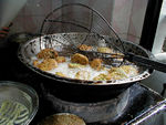 Ta'amaiyya being cooked.  Rather like falafel but with green stuff in it that makes it lighter.  