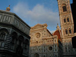  The duomo or Santa Maria del Fiore (St. Mary of the Flower, the "flower" is apparently Jesus).  The Babtistery is on the left.  Dante was baptised here.