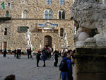 Piazza della Signoria is the plaza in front of the Palazzo Vecchio.  It was he seat of the Signoria of the Florentine Republic in the 14th century and then the government centre of the Medici grand dukes of Tuscany.  It is built in a style which some serious people call Tuscany Gothic.  In the background is copy of Michelangelo's David.  The original stood here for centuries.  It was commissioned for the top of the cathedral, but the city thought the sculpture too important to be placed rather out of sight, so they put it here.  In the 1800s, after the enlightened Florentines had died out, David was moved to an art gallery, Accademia.  In this way, people could be charged outrageous sums to see it.  We paid the outrageous sum, and felt a bit like marks paying to see a sideshow at Barnum's or Hall's Cardiff giant.  