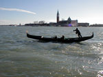 Windy day and this gondolier was working hard.