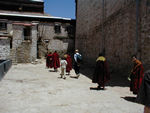 Mark and Maggie following the monks.  They had just gotten out of class and were headed to their living quarters.