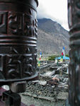 View of the village rooftops with prayer wheels (and prayer flags)