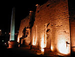 The entrance to Luxor Temple, carved with the military exploits of Ramses II.  In these reliefs he is enormous compared to everyone else.