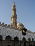 Minaret.  It is used by the muezzin ("crier") to proclaim the call to worship (adhan) five times each day. Nowadays he uses a microphone and a speaker system