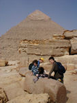 Reading about the pyramids, with  Khafra in the background.