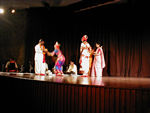 Kuchipudi is one of six classical dance styles of India. Kuchipudi is indigenous to the state of Andhra Pradesh and differs from the other five classical styles by the inclusion of singing.   Traditionally, the dancers were male, but in modern times woman have become dancers.  Compared to Kathekali, the make up was much more elaborate and this performance was much, much more athletic.  The singing was interesting and fascinating.