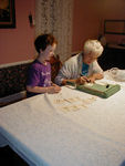 Maggie teaching Grandma her multiplication tables